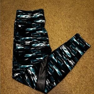 NWT Fabletics Black and Teal Patterned Leggings Size Medium